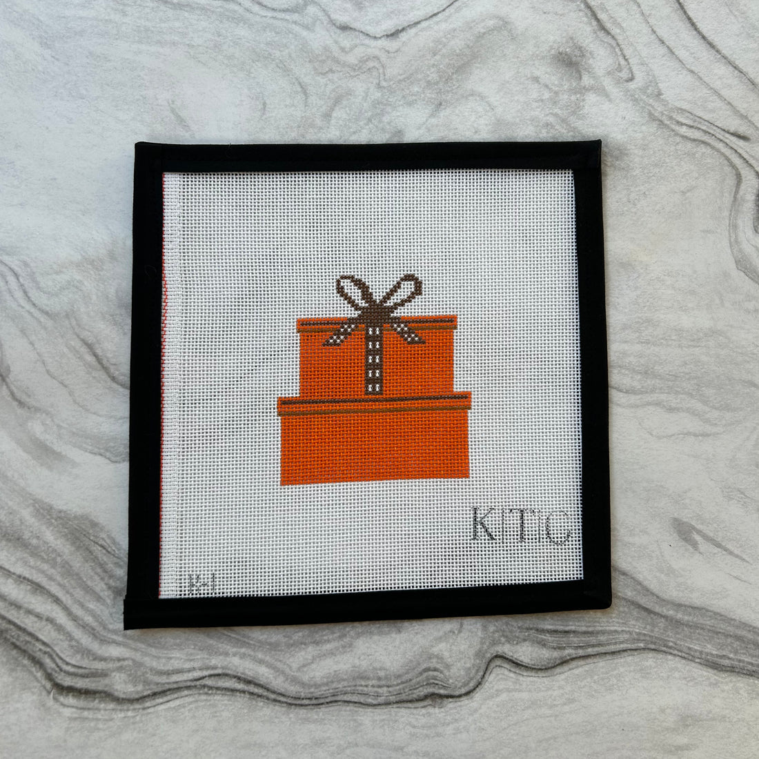 Orange Gifts Stack - The Flying Needles
