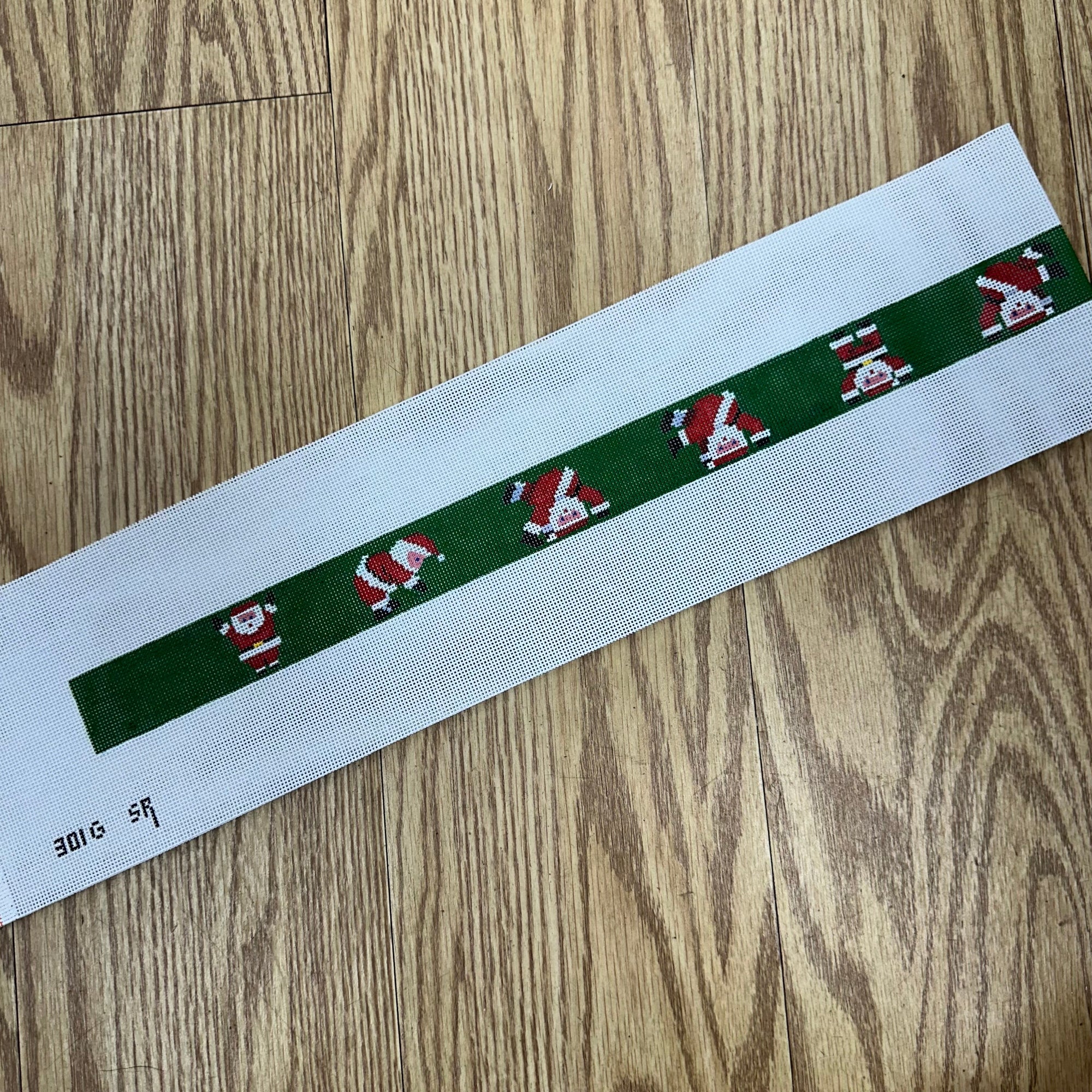 Tumbling Santas, Dark Green Background, Belt - 18 mesh - The Flying Needles